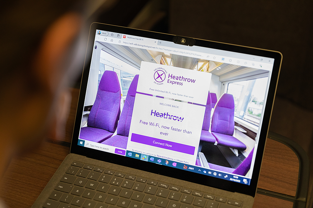 A picture of a laptop with the Heathrow Express website on it